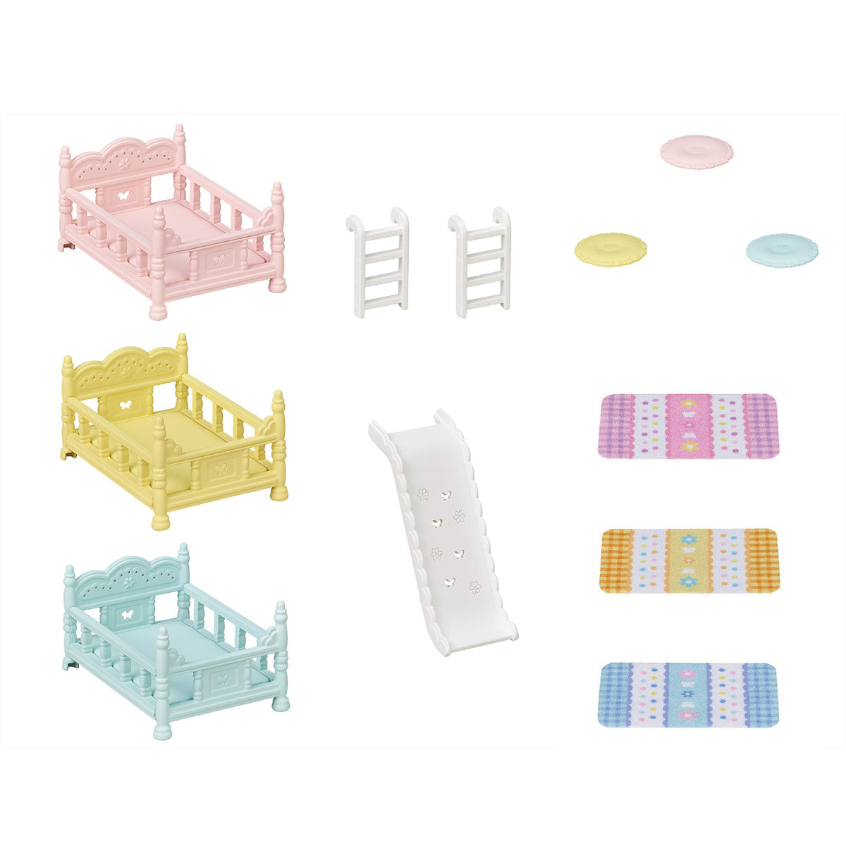 Triple Bunk Beds set with three pastel baby-sized beds, ladders, slide, and matching pillows and duvets.