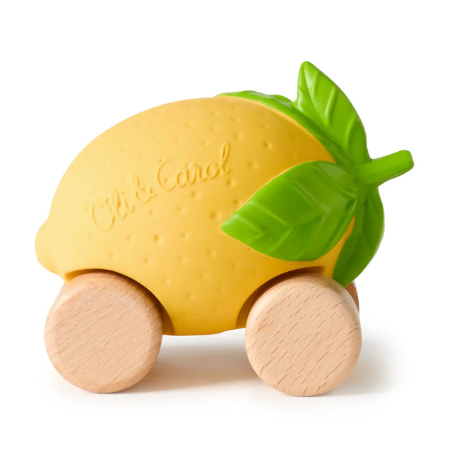 Yellow lemon-shaped baby car toy with wooden wheels and green leaf details for sensory play