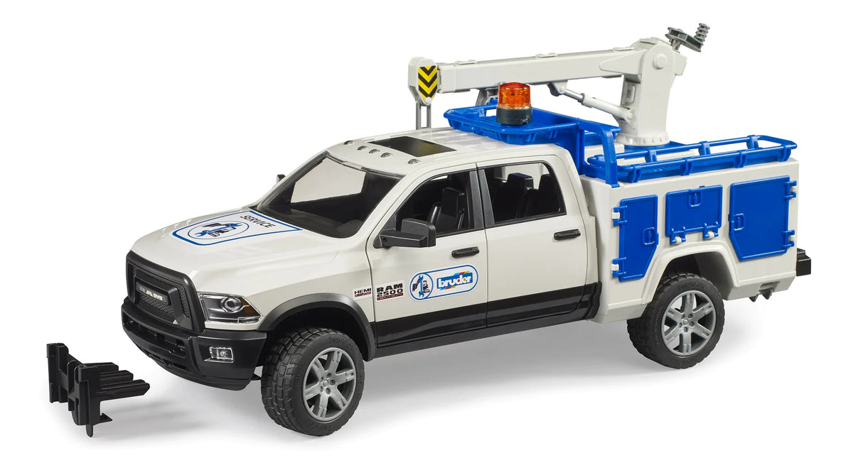 RAM 2500 Service Truck model with assembly crane, storage compartments, and tailgate, designed for commercial repair tasks.