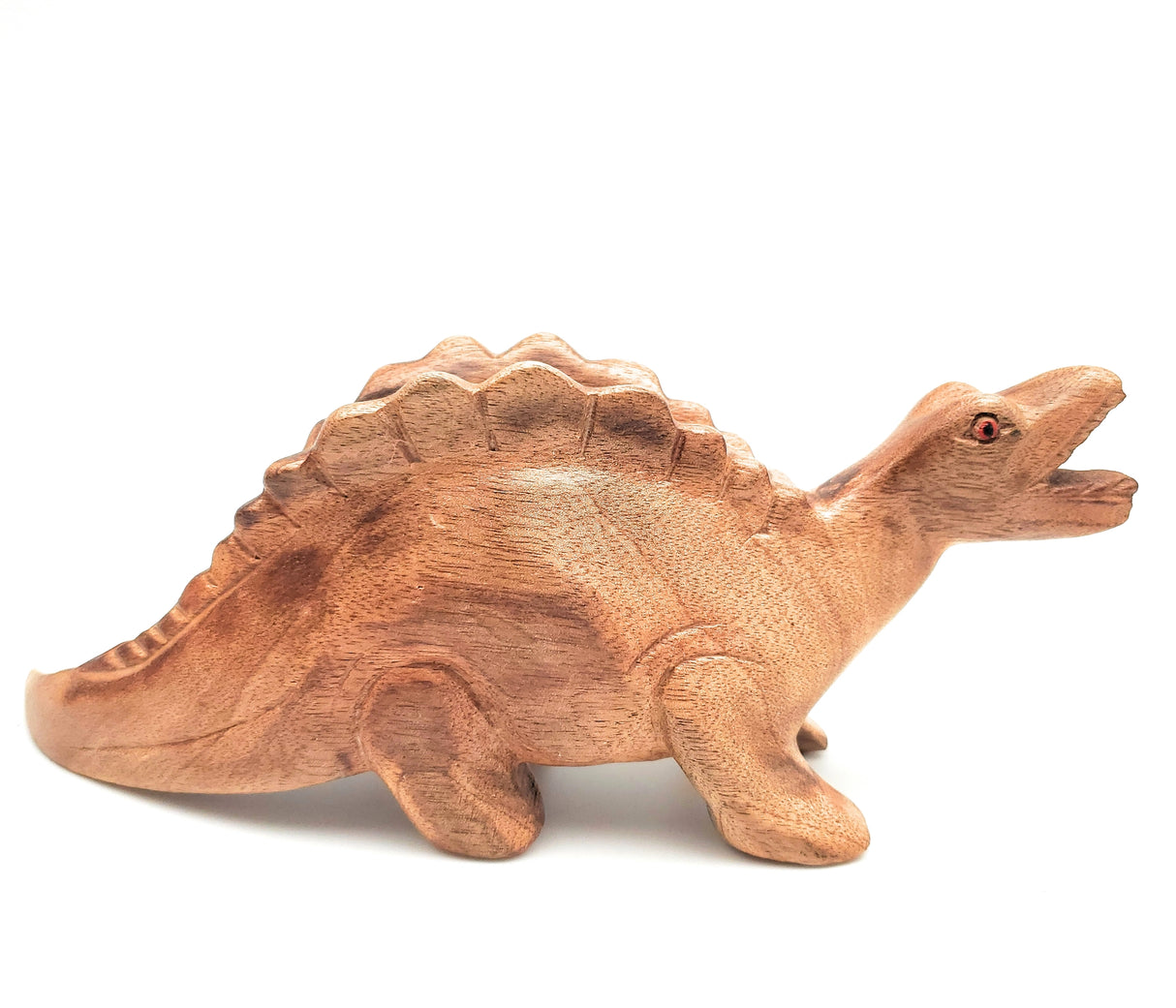 Wooden Dino-Sound Stegosaurus handcrafted wooden dinosaur carving that creates sounds when blown into the air hole.