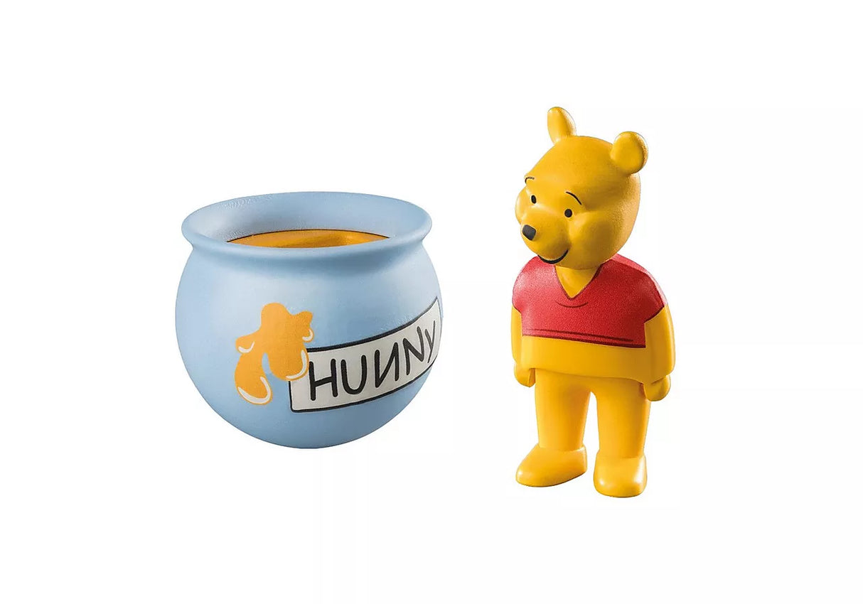 123 Winnie's Wobbly Honey Pot toy featuring a Winnie the Pooh figure and a blue honeypot promoting fine motor skills.