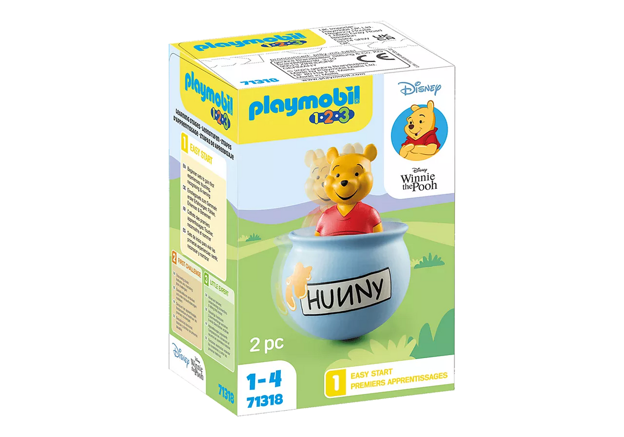 123 Winnie's Wobbly Honey Pot toy packaging featuring Winnie the Pooh figure and stand-up honeypot.