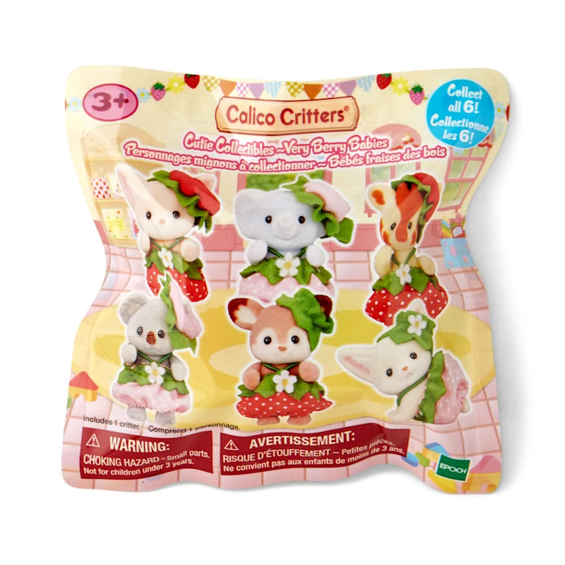 Calico Critters Very Berry Babies blind bag with six small animal figures wearing strawberry-themed outfits.