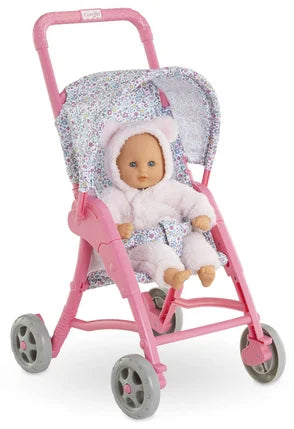 Stroller Flowered with folding canopy and security belt holding a baby doll in a pink frame with floral print fabric.