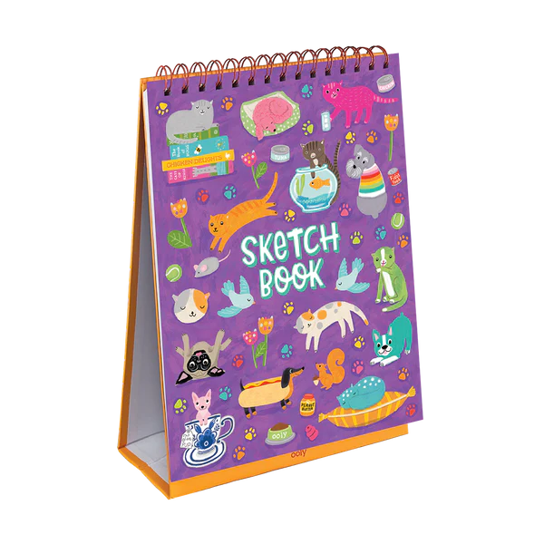 Sketchbook Pets at Play features a purple cover with playful illustrated cats, dogs, and other pets in fun activities.