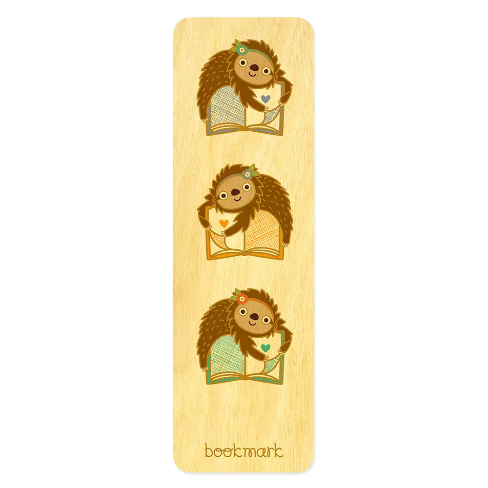 Story Sloths Wood Bookmark featuring three cute sloths holding books on a natural birch wood background.