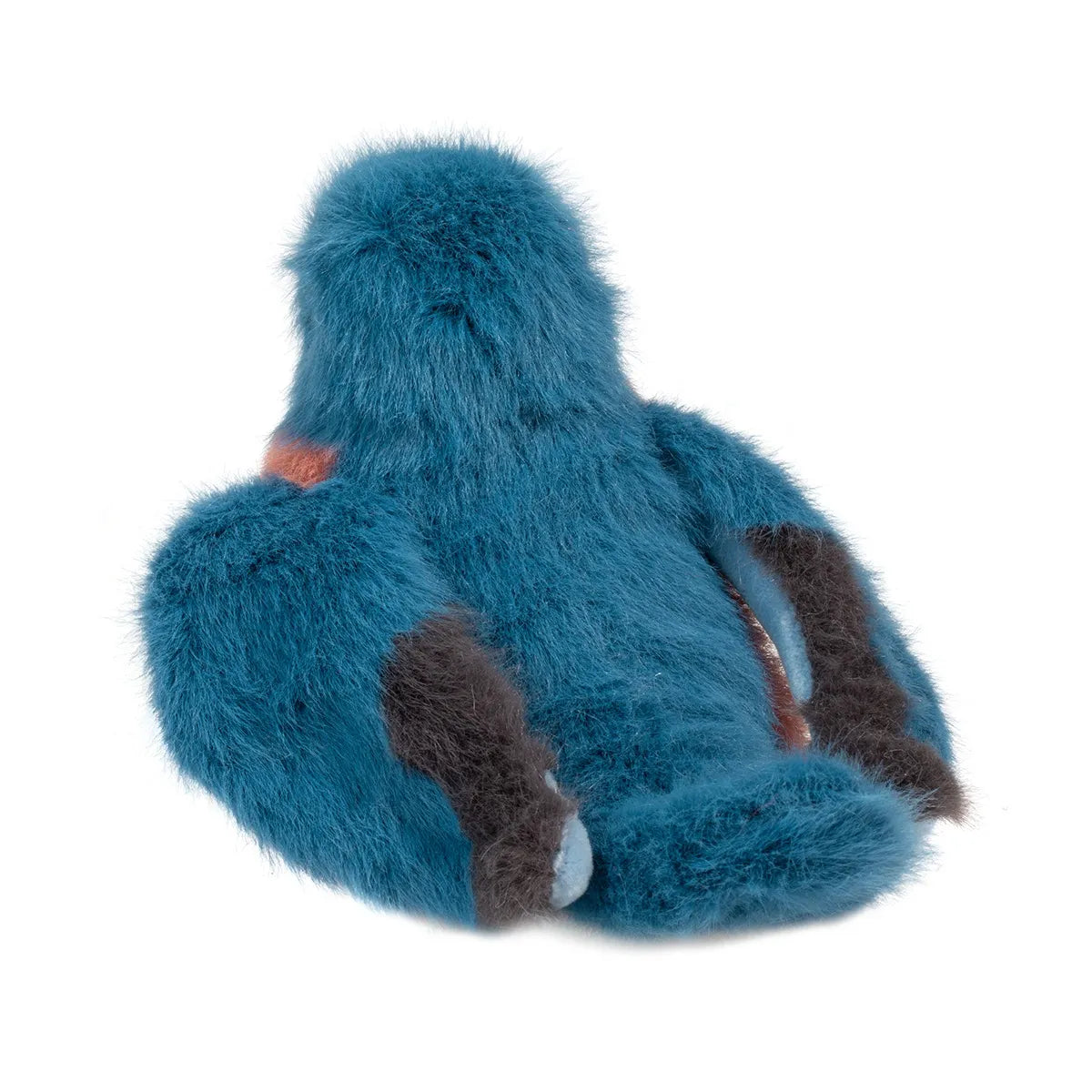Blue Bird Bertie plush toy showing soft blue fur and gray tipped wings from the back sitting upright.