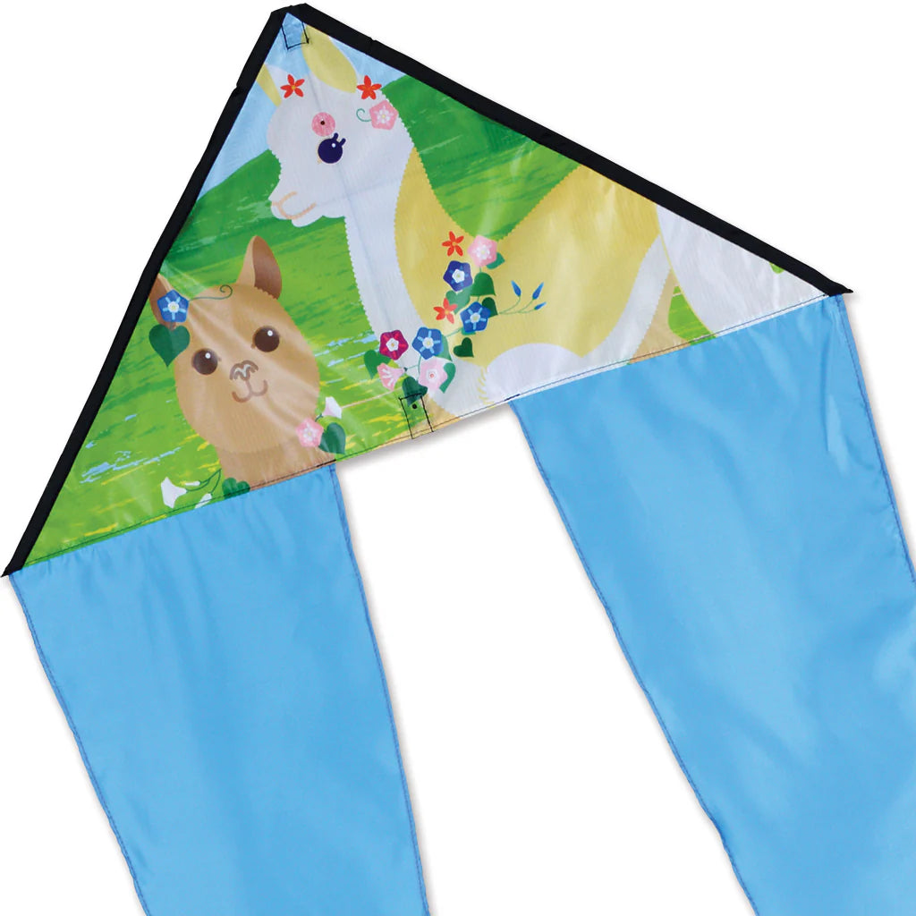 Zippy Flo-Tail Delta Kite featuring colorful alpaca print and long blue flowing tails, made with ripstop polyester fabric.