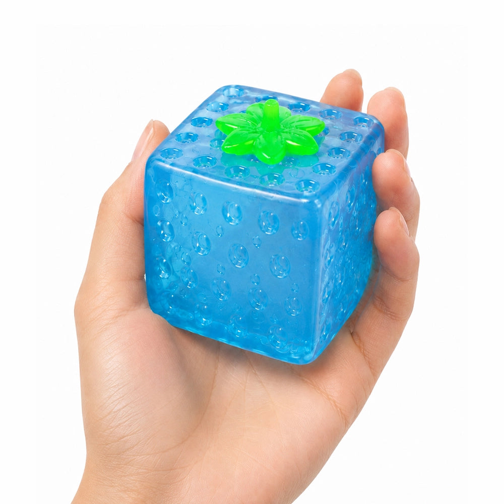 Super Duper Sugar Squisher | Fruit Cube blue sensory cube held in hand