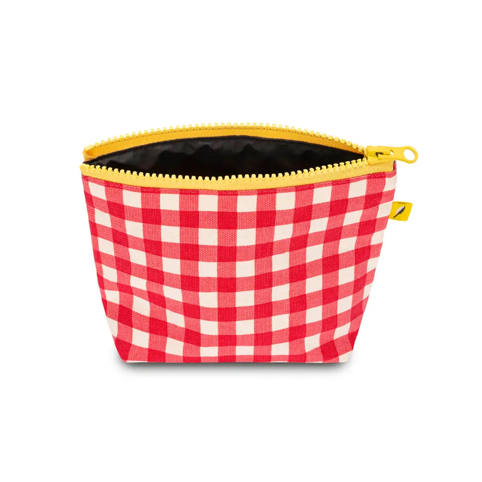 Small red gingham pouch with yellow zipper, perfect for organizing keys, earbuds, and small essentials sustainably.