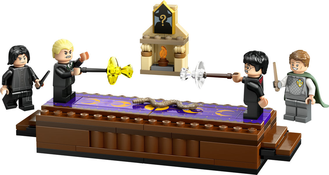 Harry Potter Hogwarts Castle: Dueling Club LEGO set with minifigures Harry, Draco, Lockhart, and Snape on battle platform.