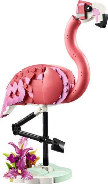 Creator Wild Animals: Pink Flamingo LEGO model with posable head on a plant-covered stand, perfect for imaginative play and decor.