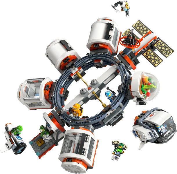 LEGO City Modular Space Station with connected modules, astronauts, solar panels, and space robot figures in white and orange colors.