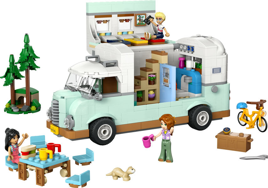 Friends Friendship Camper Van Adventure playset with camper, minidolls, bike, picnic table, and outdoor camping accessories.
