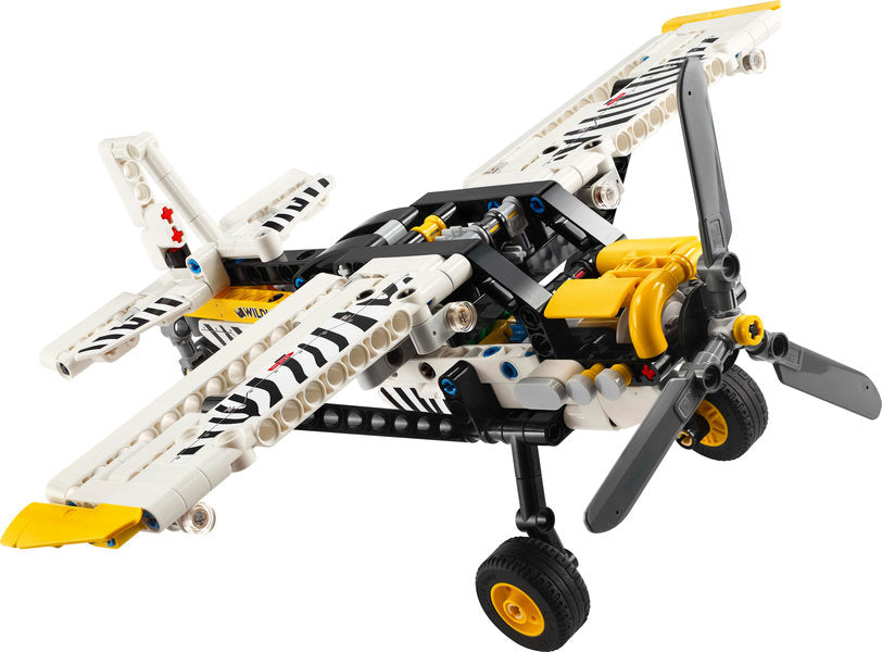 Technic Bush Plane toy with spinning propeller, adjustable wings, engine cover, and zebra print design for kids 8+.