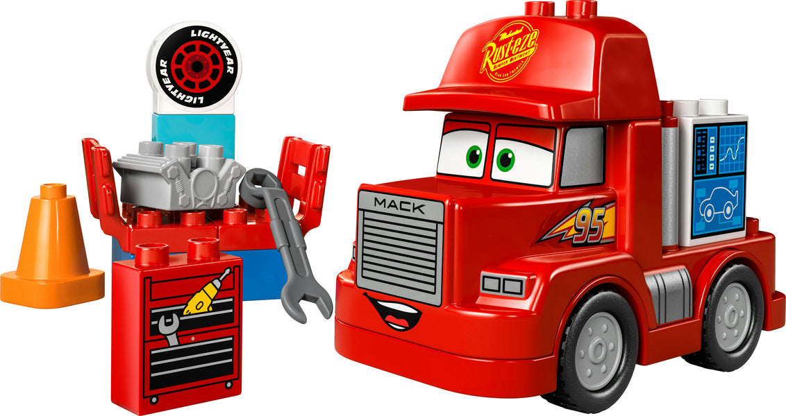 Duplo Mack at the Race featuring a buildable red Mack truck, tuning station, engine brick, and orange cone toy set for toddlers.