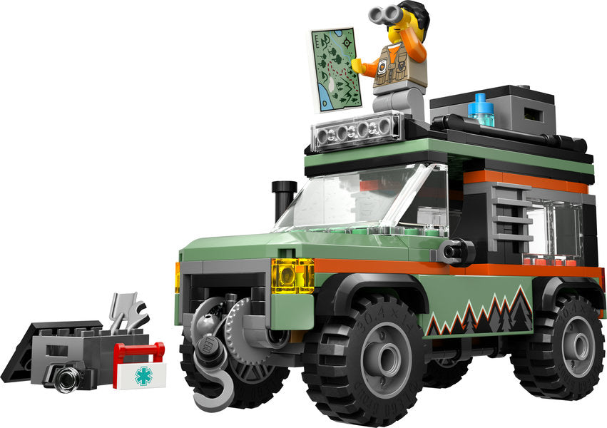 City Off-Road 4x4 Mountain Truck toy with rugged tires, roof storage, working winch, and adventurer minifigure.
