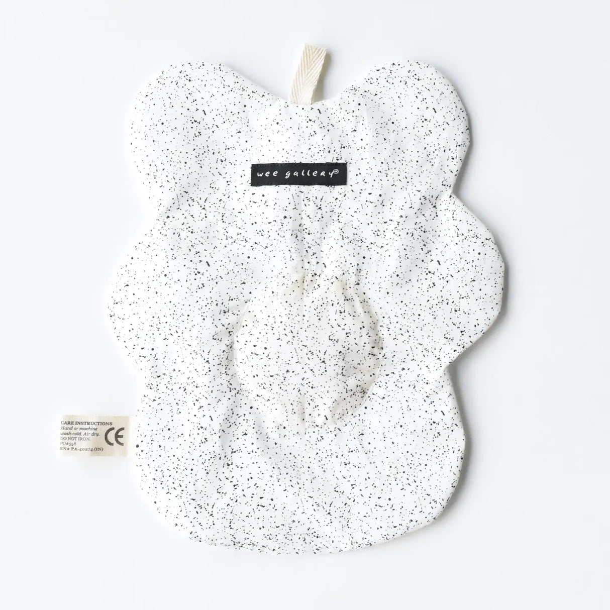 Organic Crinkle Toy | Egg in white with black speckles made of 100% organic cotton for baby sensory play.