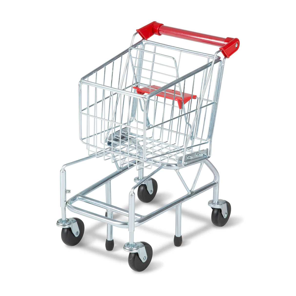 Small metal shopping cart with red plastic handle and four black wheels on white background
