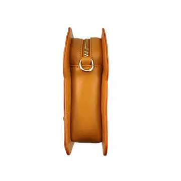 Side view of the Crossbody Handbag | Smoked Salmon Toast showing its compact, golden toast-inspired design with zipper detail.