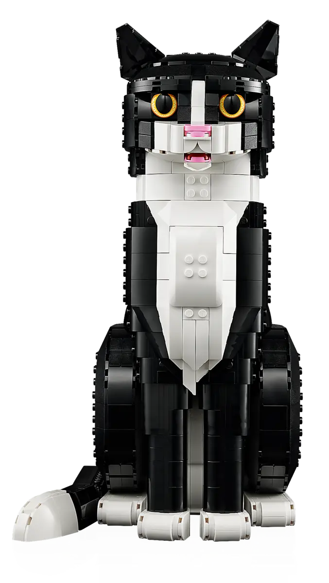 Ideas Tuxedo Cat buildable model with adjustable ears, paws, tail, and yellow eyes, perfect for cat and LEGO fans.