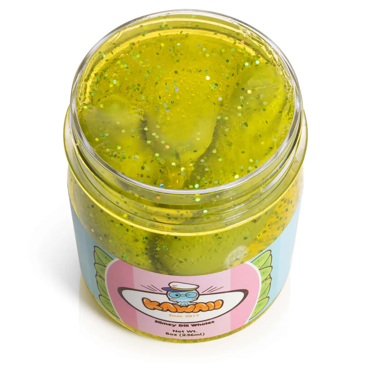 Shimmery Pickle Clear Slime in jar with glitter and embedded pickle-shaped erasers, scented like sour dill pickles.