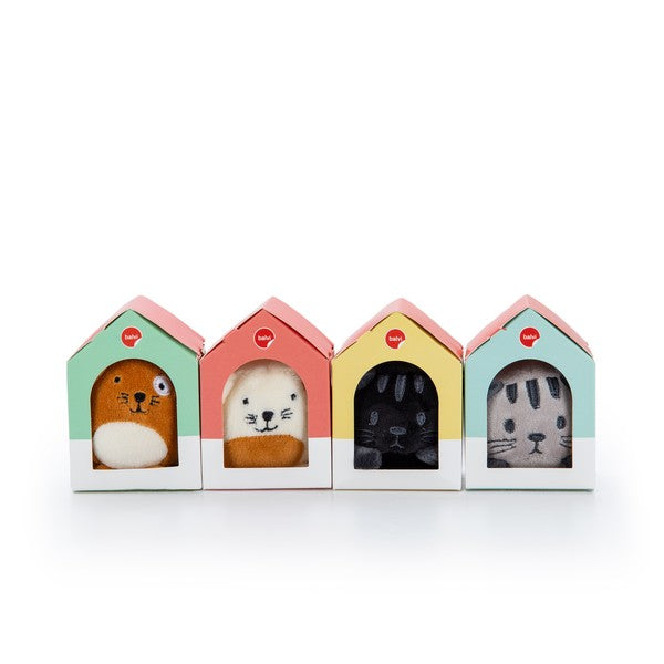 Set of four fluffy animal bookmarks in colorful house-shaped packaging, perfect for marking reading spots.