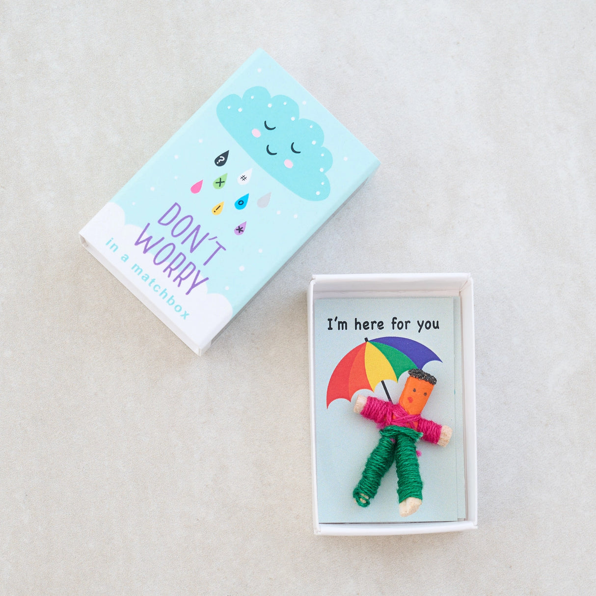 Don't Worry Doll Matchbox with colorful worry doll and supportive message inside a small decorative matchbox.