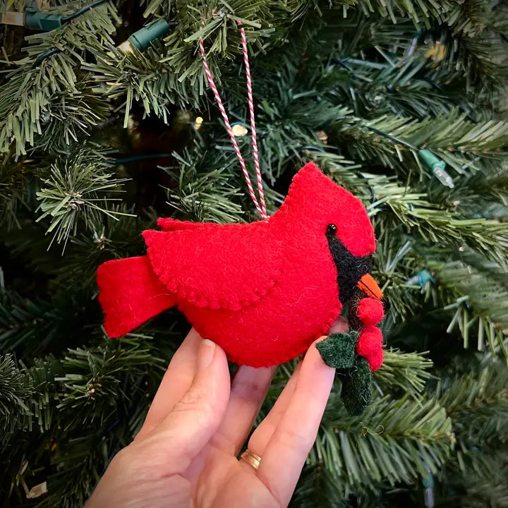 Cardinal with Holly Felt Ornament hanging on tree, handmade red felt bird holding green holly, Christmas decor.