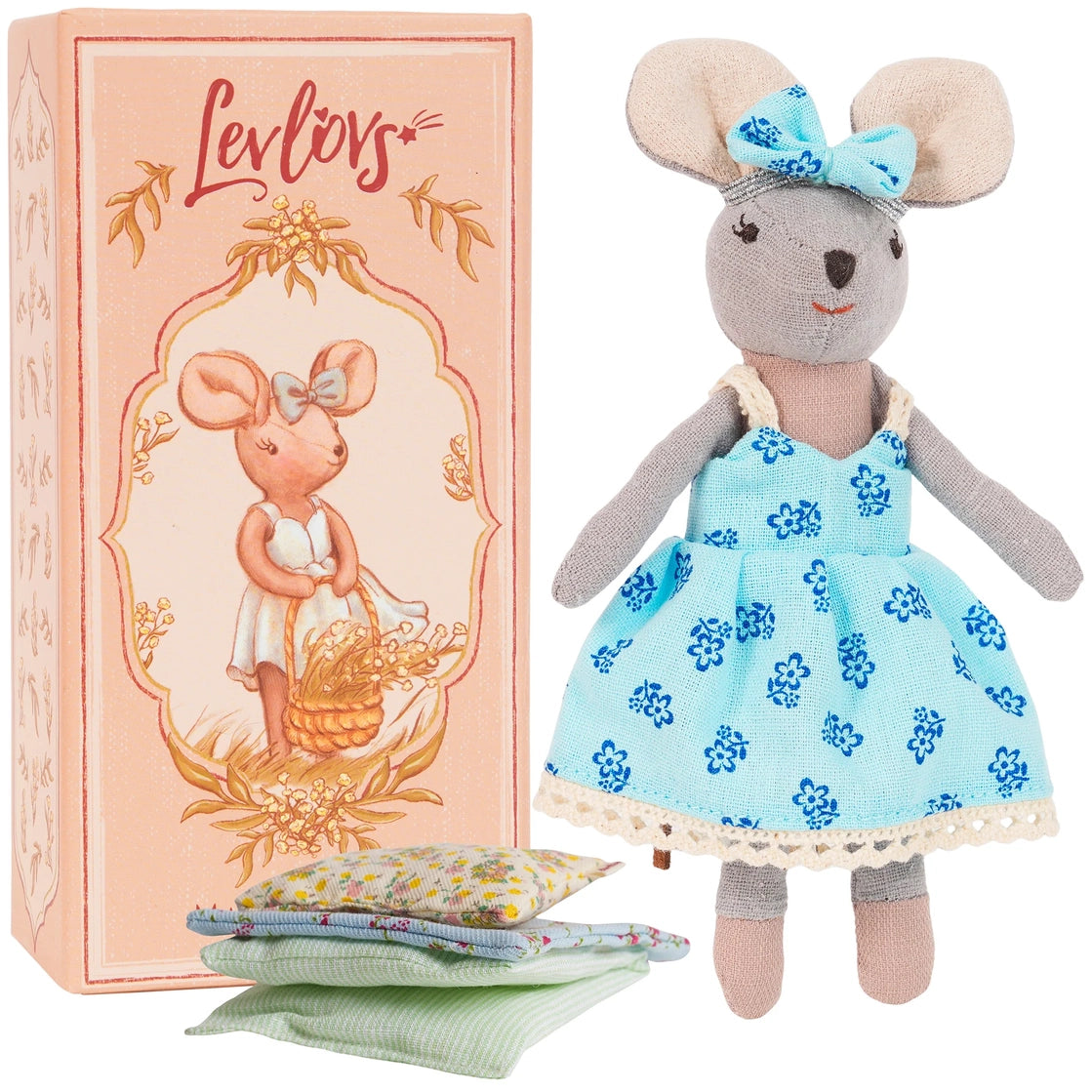 Handmade linen mouse doll wearing light blue floral dress with bow, beside decorative box and bedding set