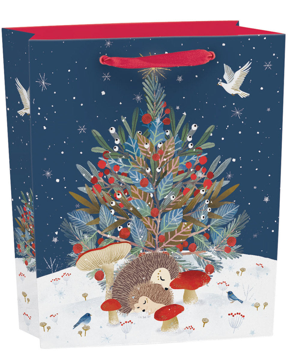 Under the Tree Gift Bag Medium featuring winter forest animals and festive tree artwork by Antoana Oreski