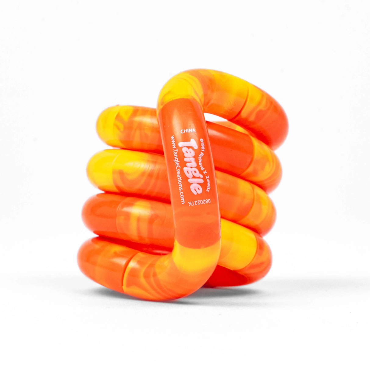 Bright orange and yellow spiral fidget toy designed to enhance creativity and focus for kids and adults