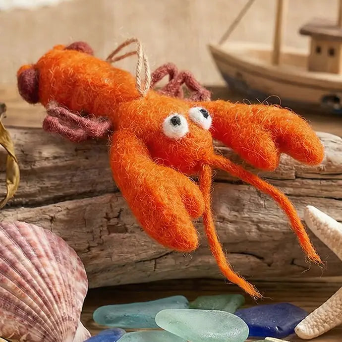Louella Lobster Felt Ornament featuring an orange felt lobster with googly eyes and dangling claws