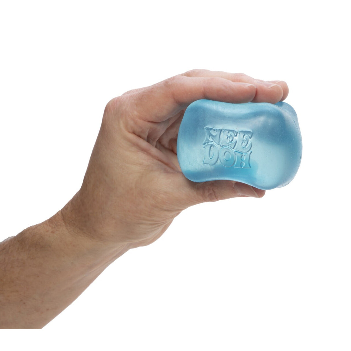 Hand squeezing a blue NeeDoh Nice Cube stress ball that returns to its square shape after squishing.