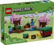LEGO Minecraft The Cherry Blossom Garden set with pink trees, bees, zombie, and buildable garden scene for ages 8 and up.