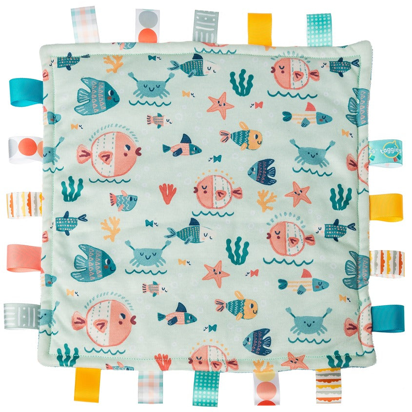 Taggies Blankie Fishies baby comfort blanket with colorful fish pattern and looped ribbons for sensory play.