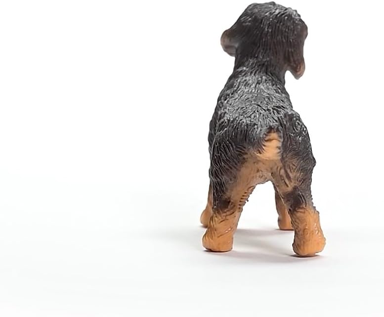 Wire-Haired Dachshund toy figure showing detailed textured fur and realistic colors from the back view.