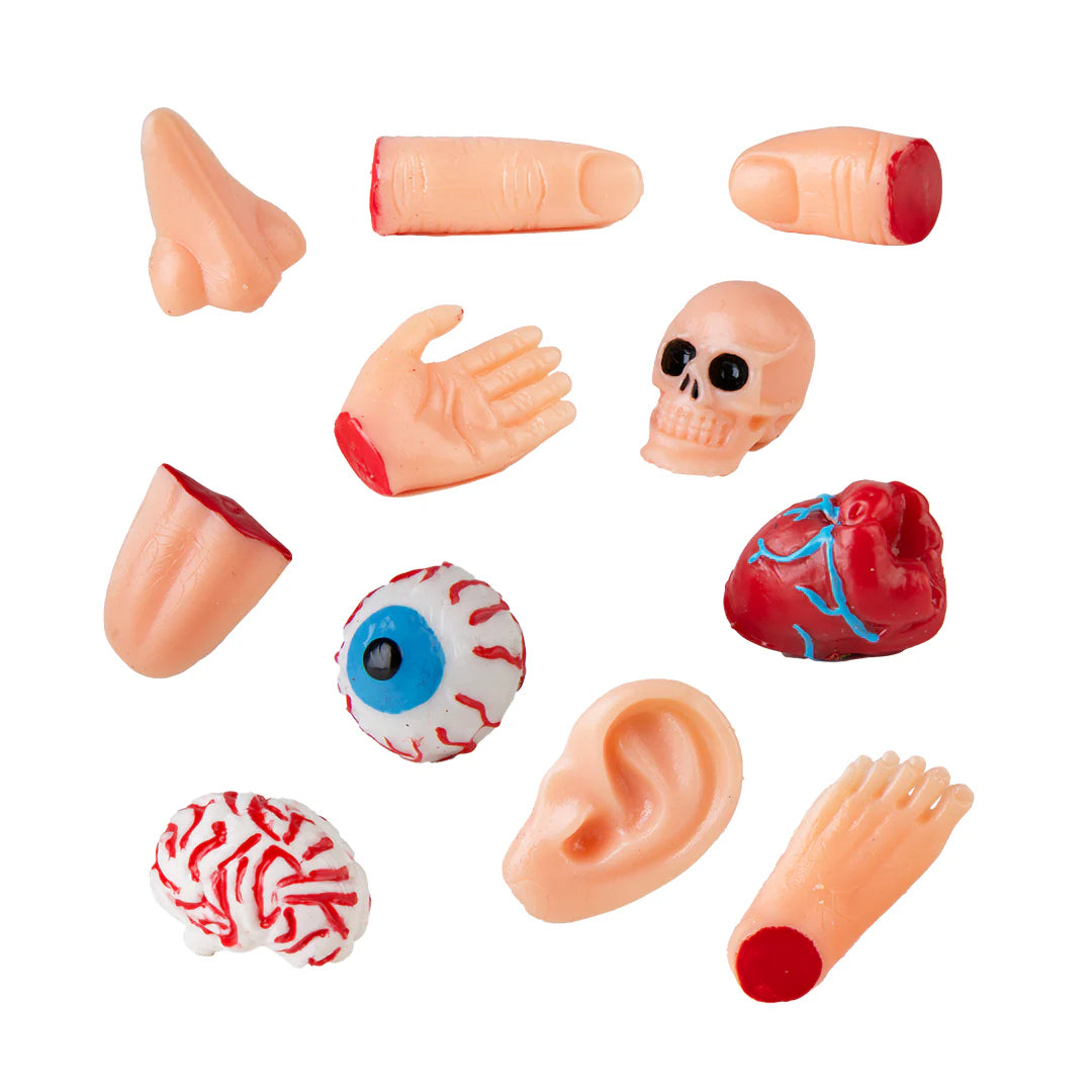 Collection of sticky, stretchy collectible body parts including hand, skull, heart, brain, eye, ear, nose, tongue, finger, and foot toys.