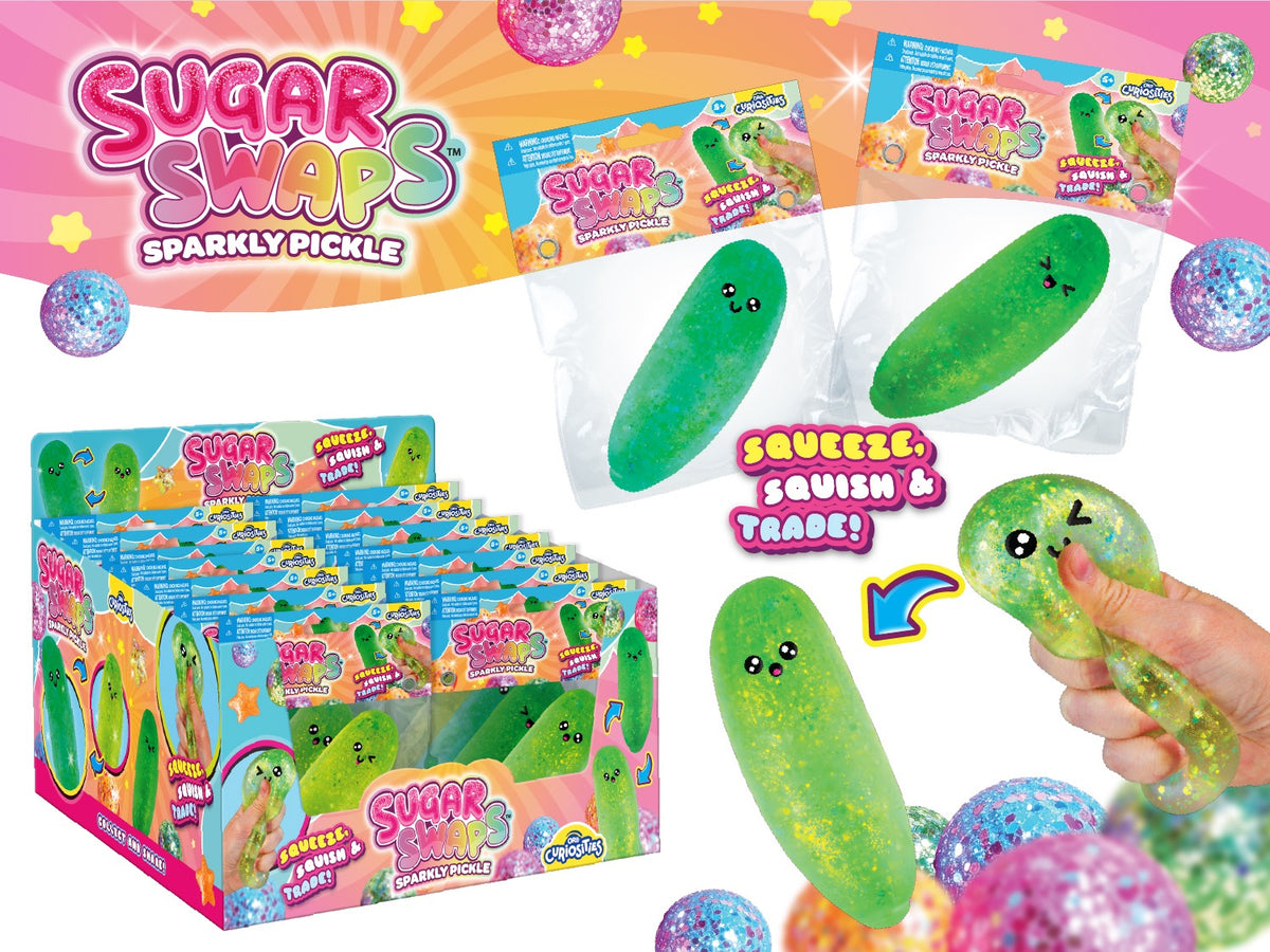 Sugar Swaps Sparkly Pickle green glittery squishy toy shown in packaging and being squeezed