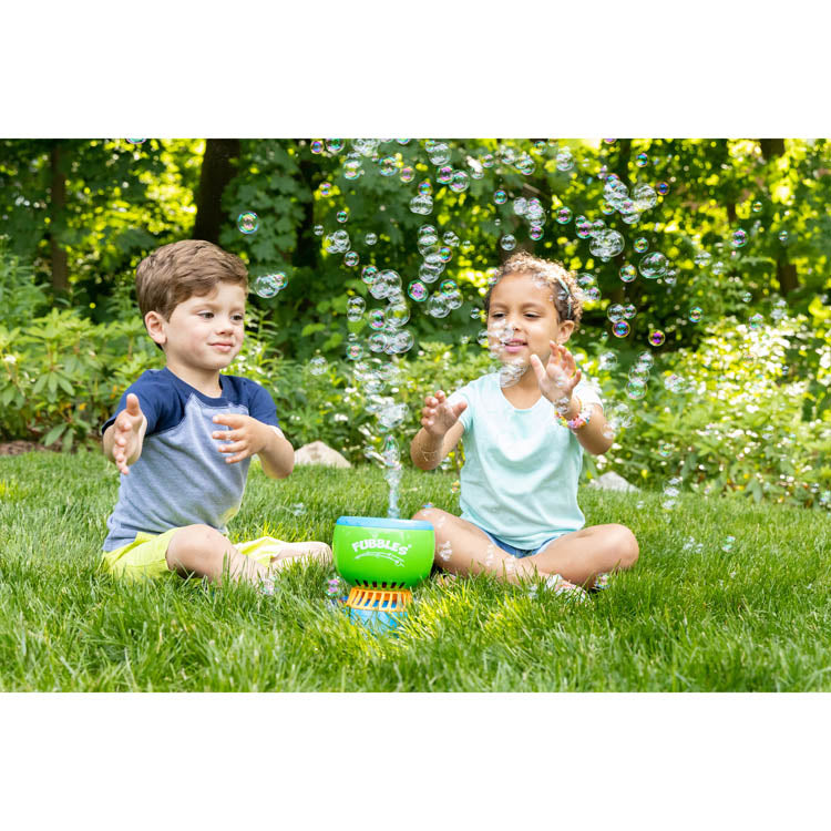 Children playing outdoors with the Fubbles | No-Spill Fun-Finiti Bubble Machine creating bubbles nonstop.