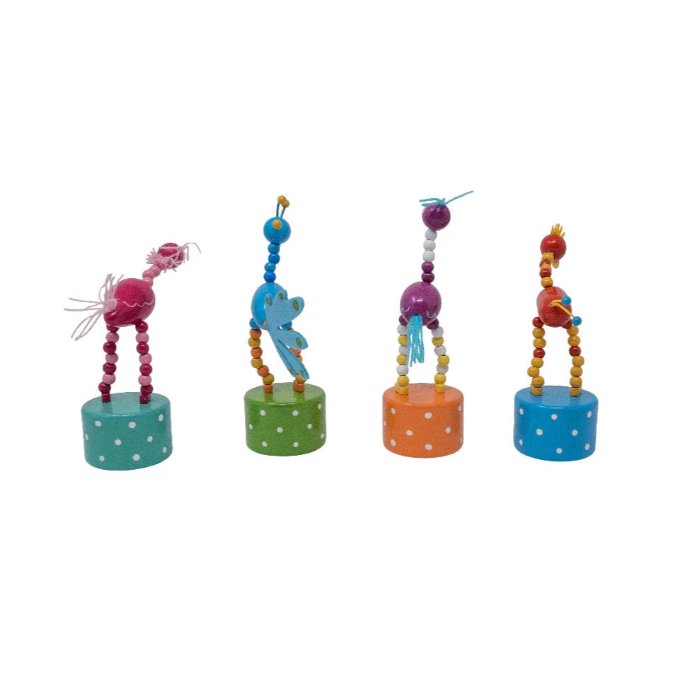 Colorful ThumbToy Bird push puppets with beaded legs on polka dot bases, perfect fun gifts for kids ages 3 and up.