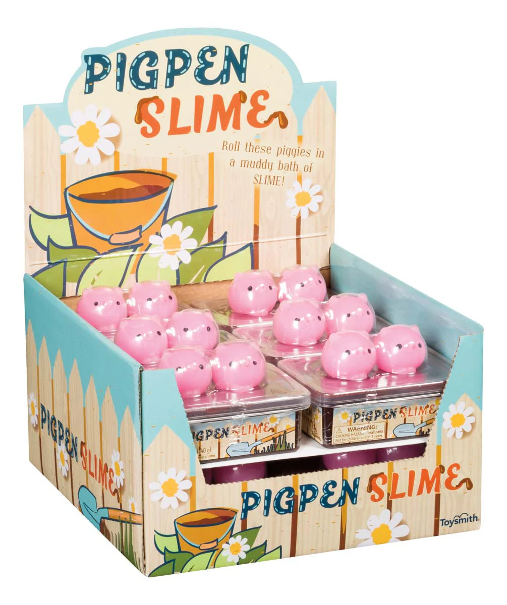 Pigpen Slime with 2 squishy pink piggies and a container of gooey brown slime in display box for kids.