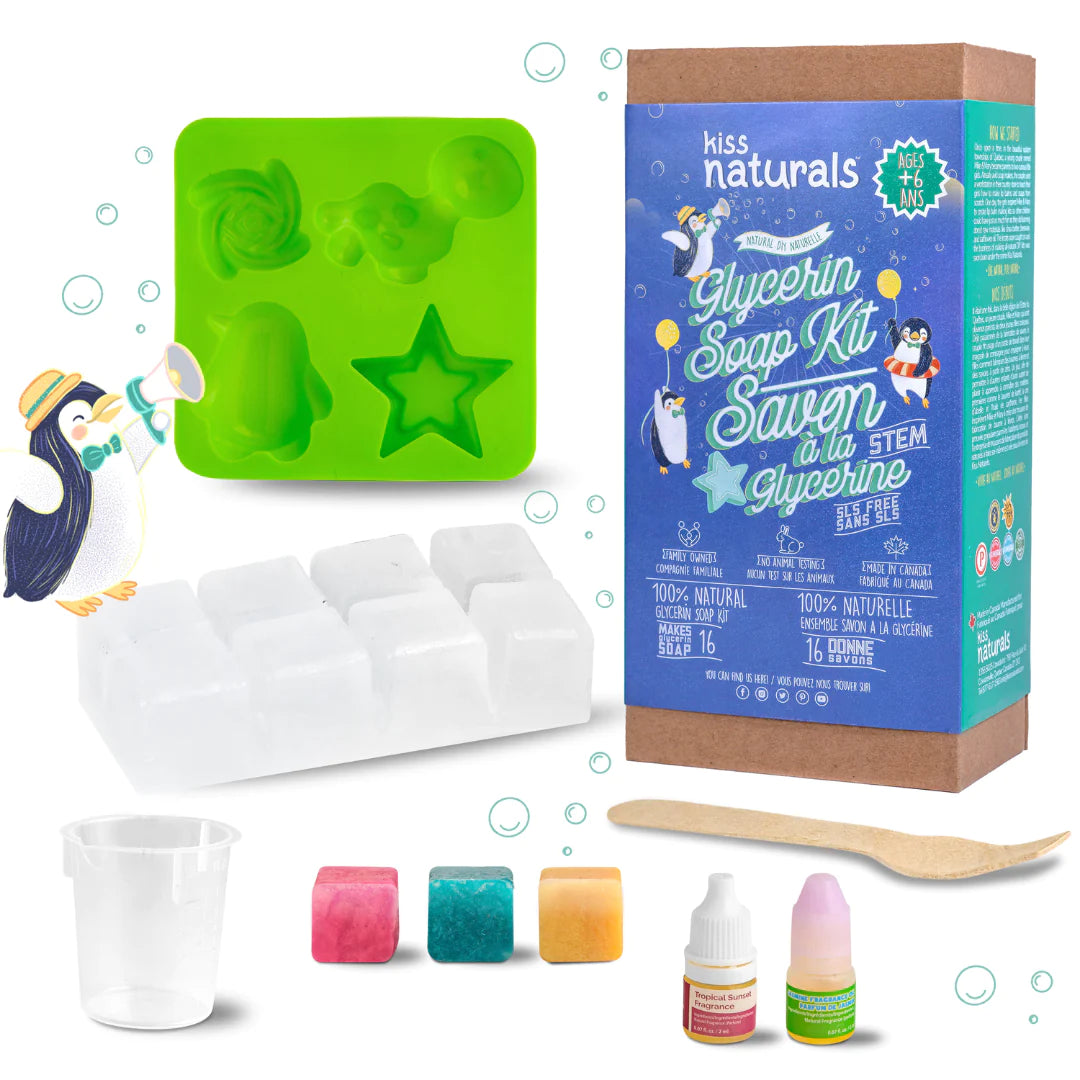 DIY Glycerin Soap Kit with soap molds, color bars, measuring cup, wooden spoon, and scented oils for kids soap making.