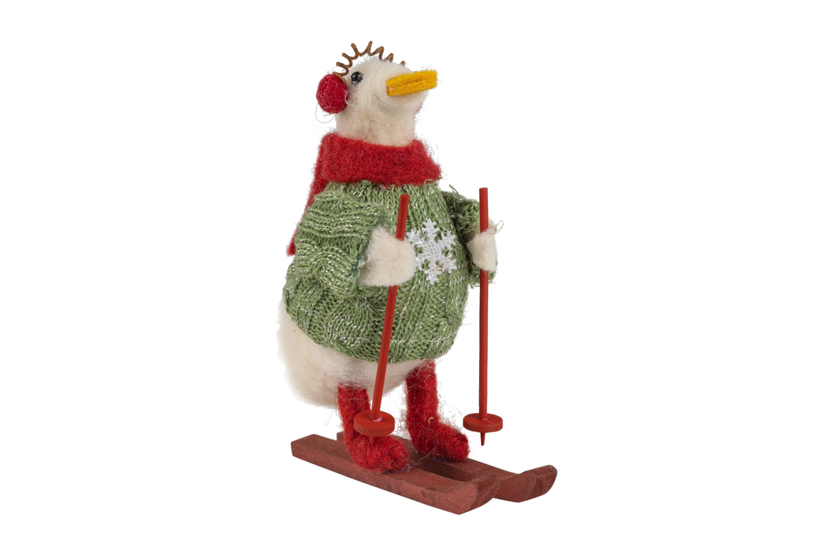 Skiing Goose Felt Ornament featuring a felt wool goose on skis in a green sweater with red accessories.