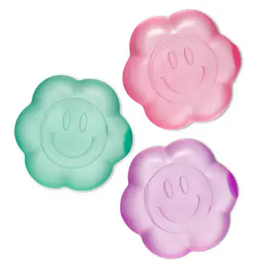 Super Duper Sugar Squisher | Daisy showing three colorful squishy flowers with smiley faces and cool-to-touch exterior.