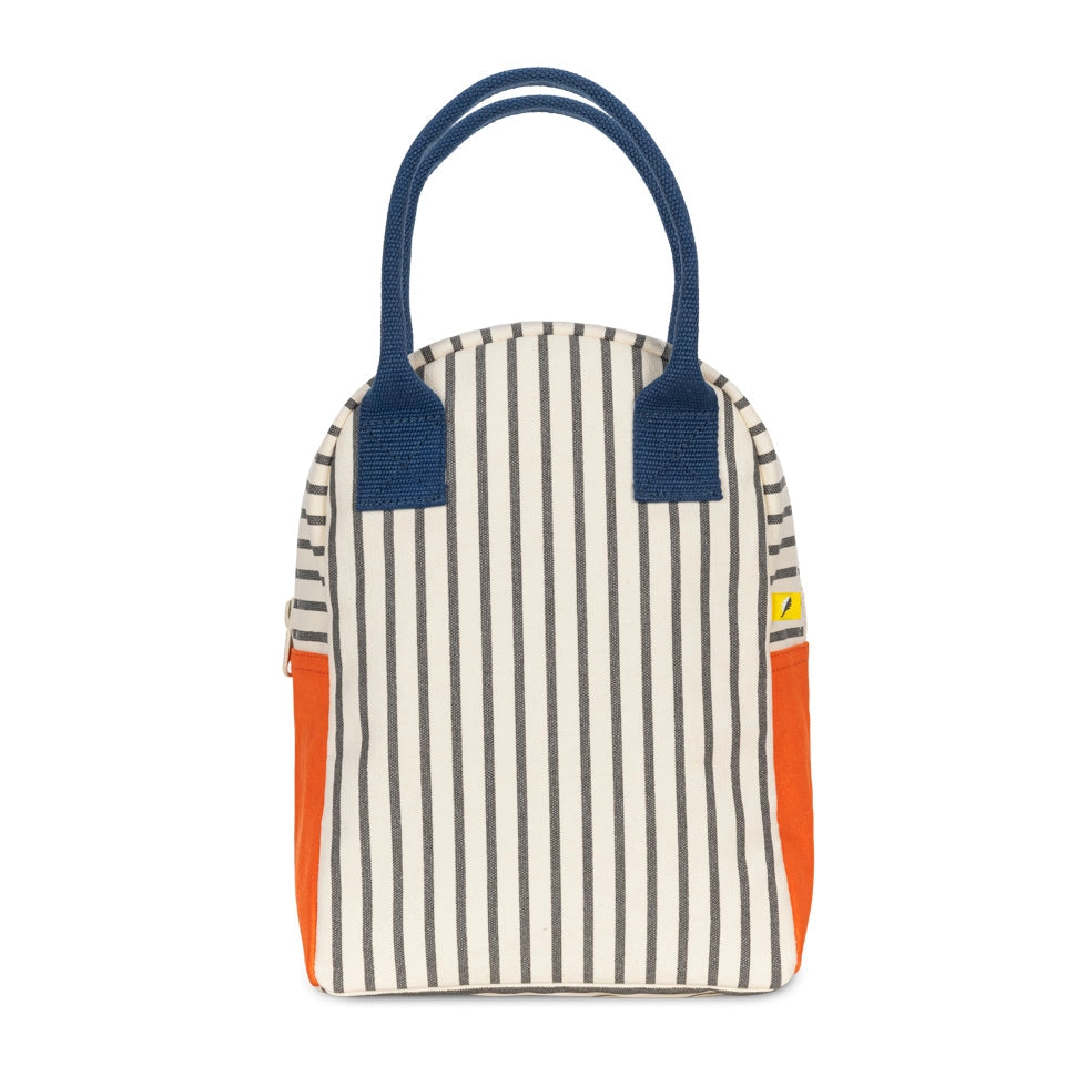 Roomy zipper lunch bag with pencil stripe design, navy handles, and orange side panels, made from organic cotton.