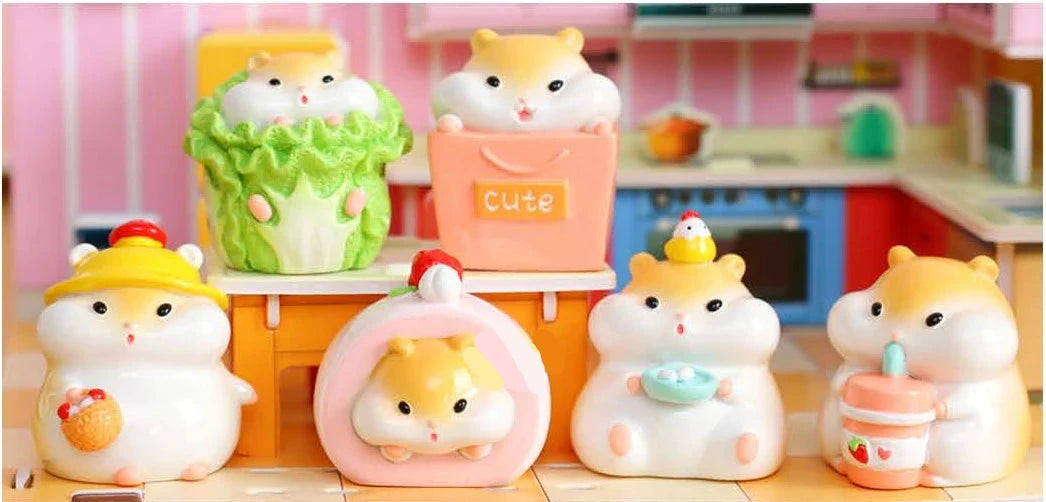 Hamster Figurine Blind Box showing six cute hamster resin figures in various playful poses and colorful accessories.