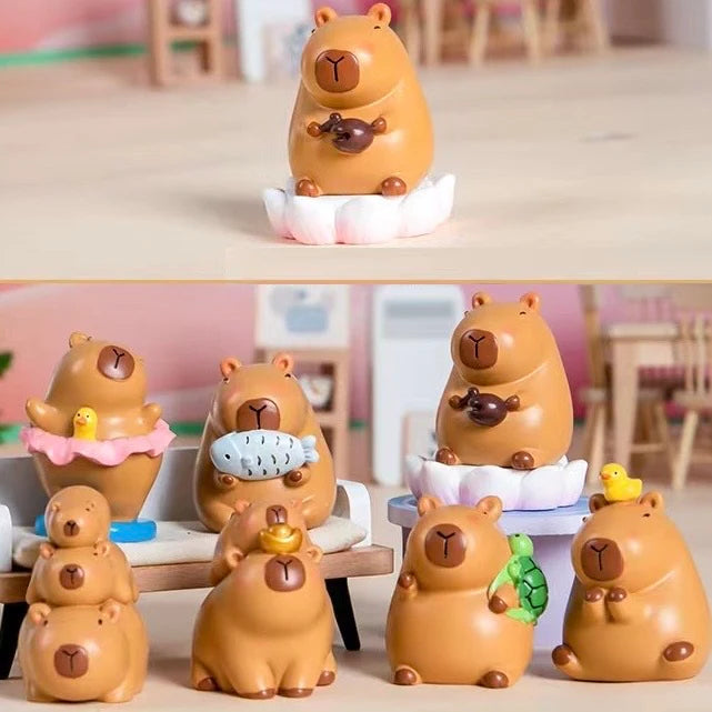 Capybara Life Blind Box resin figurines showing assorted cute capybara animals in playful poses.