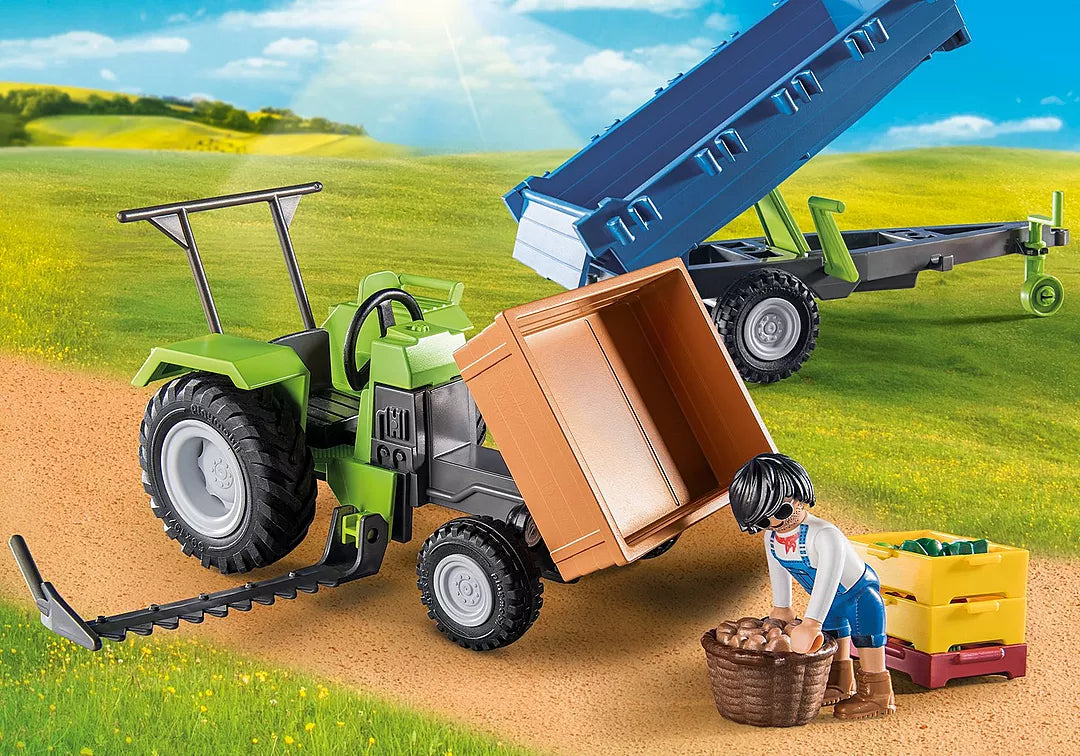 Country | Harvester Tractor w/Trailer toy with tiltable loading area unloading vegetables in a bright farm setting.