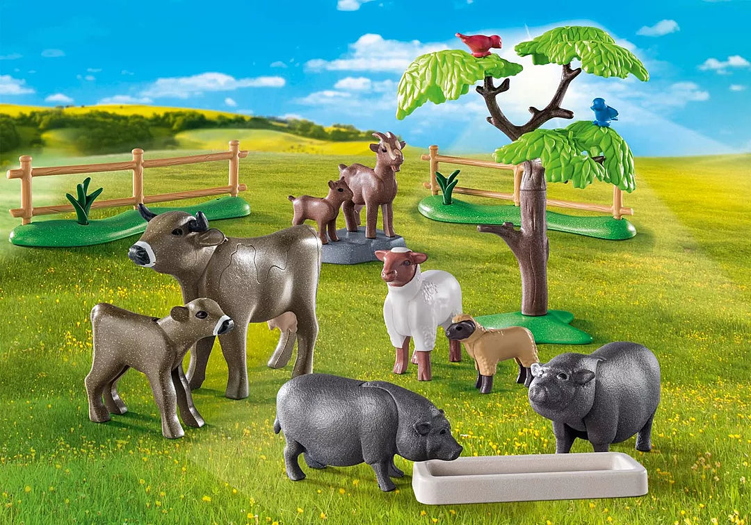 Country | Animal Enclosure with cow, goat, sheep, and pot-bellied pig figures in a farm playset scene.